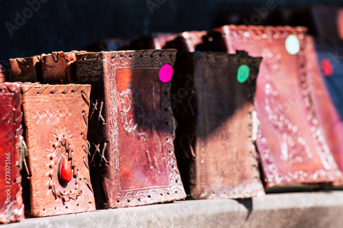 Closeup of traditional decorative objects sold in souvenirs shops in the streets of Reims in France photo