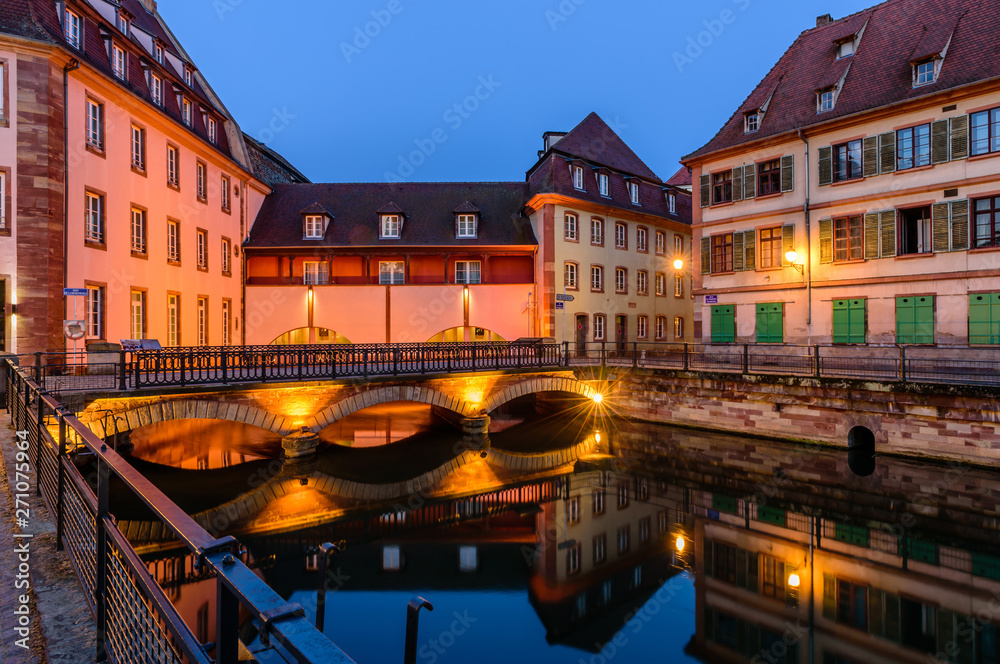 Sightseeing of France. Beautiful night view of Petite France quarter. A popular attraction in Strasbourg