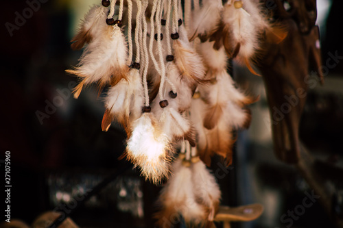 Closeup of traditional decorative objects sold in souvenirs shops in the streets of Reims in France photo