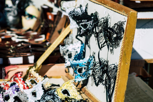 Closeup of traditional decorative objects sold in souvenirs shops in the streets of Reims in France photo