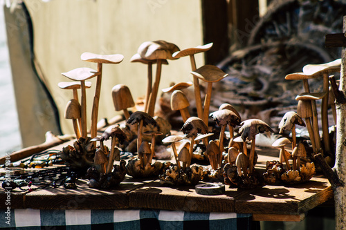 Closeup of traditional decorative objects sold in souvenirs shops in the streets of Reims in France photo