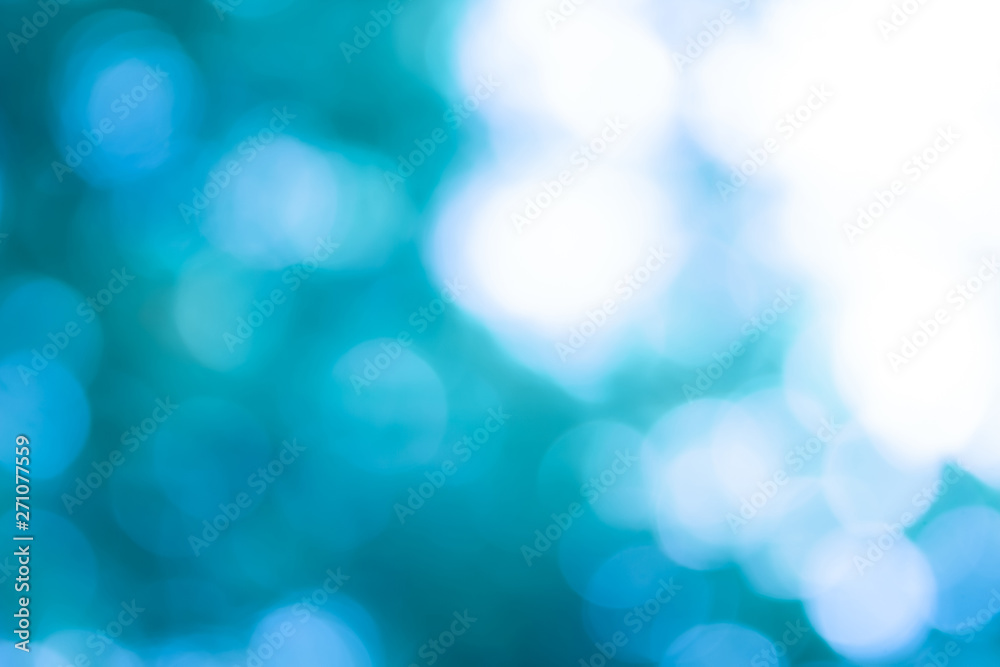 blue blur abstract background. bokeh christmas blurred beautiful shiny Christmas lights. blue blur abstract background. bokeh christmas blurred beautiful shiny Christmas lights.