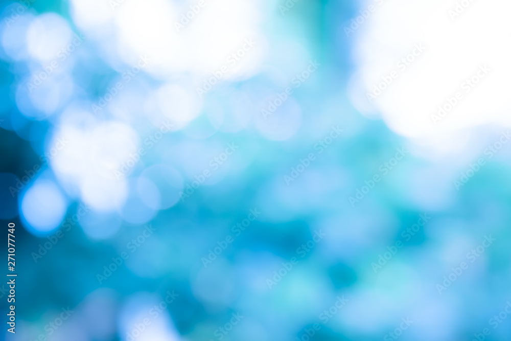 blue blur abstract background. bokeh christmas blurred beautiful shiny Christmas lights. blue blur abstract background. bokeh christmas blurred beautiful shiny Christmas lights.