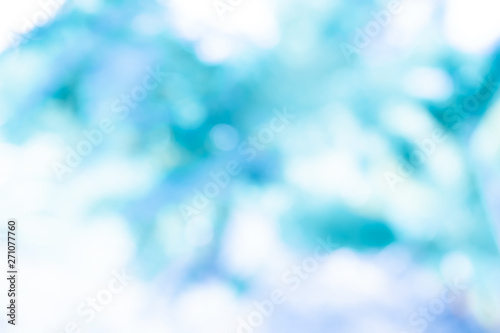 blue blur abstract background. bokeh christmas blurred beautiful shiny Christmas lights. © ooddysmile