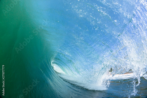 Fototapeta Naklejka Na Ścianę i Meble -  Ocean Swimming Inside Hollow Crashing Wave Closeup Water Photo
