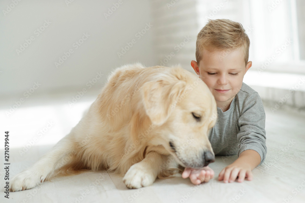 Child with a dog at home Child with a dog at home