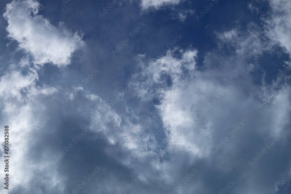 background white fluffy clouds high in the sky background white fluffy clouds high in the sky