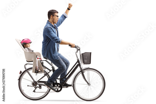 Happy father riding a baby in a bicycle child's seat