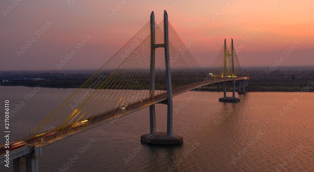 Obraz premium Neak Loeung bridge at PhnomPenh - Cambodia on sunset , this is a longest bridge at Cambodia
