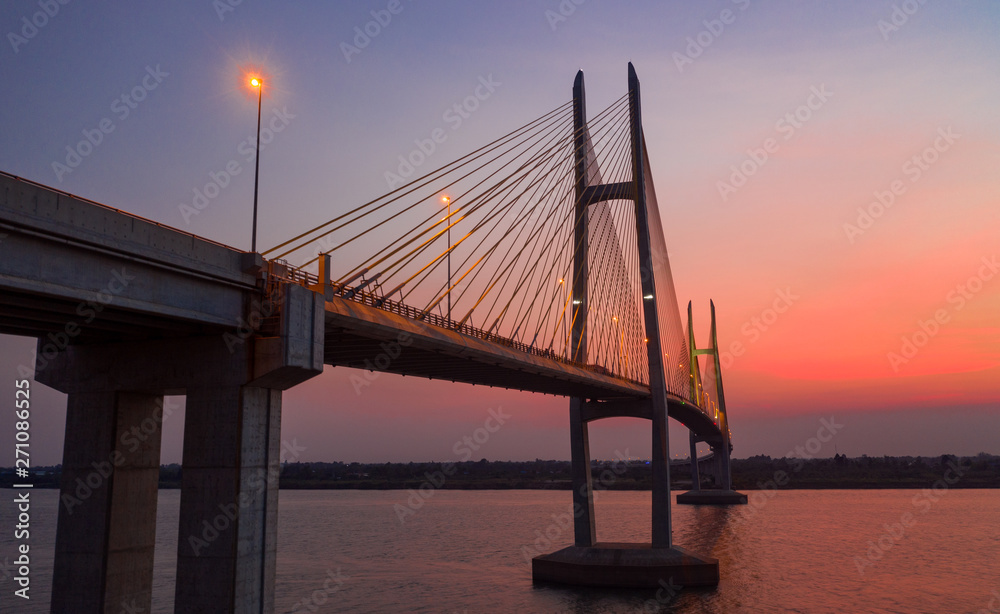 Obraz premium Neak Loeung bridge at PhnomPenh - Cambodia on sunset , this is a longest bridge at Cambodia
