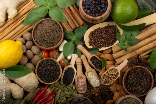 various spices on wooden background