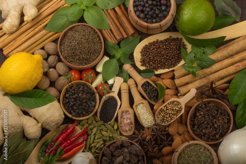 various spices on wooden background