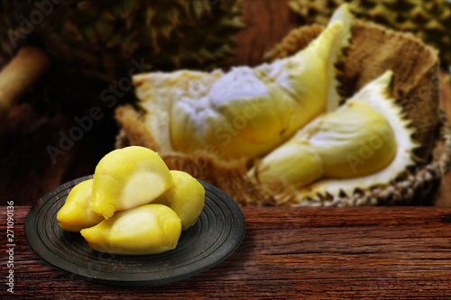 Thai dessert : Durian mochi or moon cake or Durian daifuku on wood chop, Moon cake for Mid autumn festival, Chinese happy new year and Moon festival. Still life in studio.