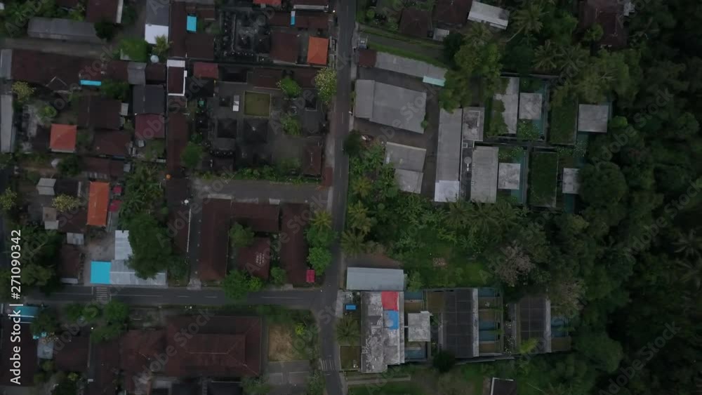 Aerial Descent: Tropical Town on Cloudy Day - Ubud, Bali Aerial Descent: Tropical Town on Cloudy Day - Ubud, Bali