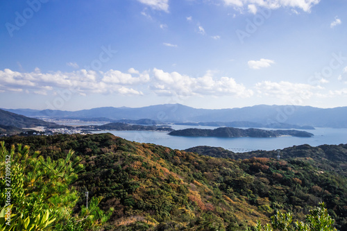 Landscape of Itoshima from mountain in Itoshima, Fukuoka, Japan. In image, there are small islands in the sea of Genkai. photo
