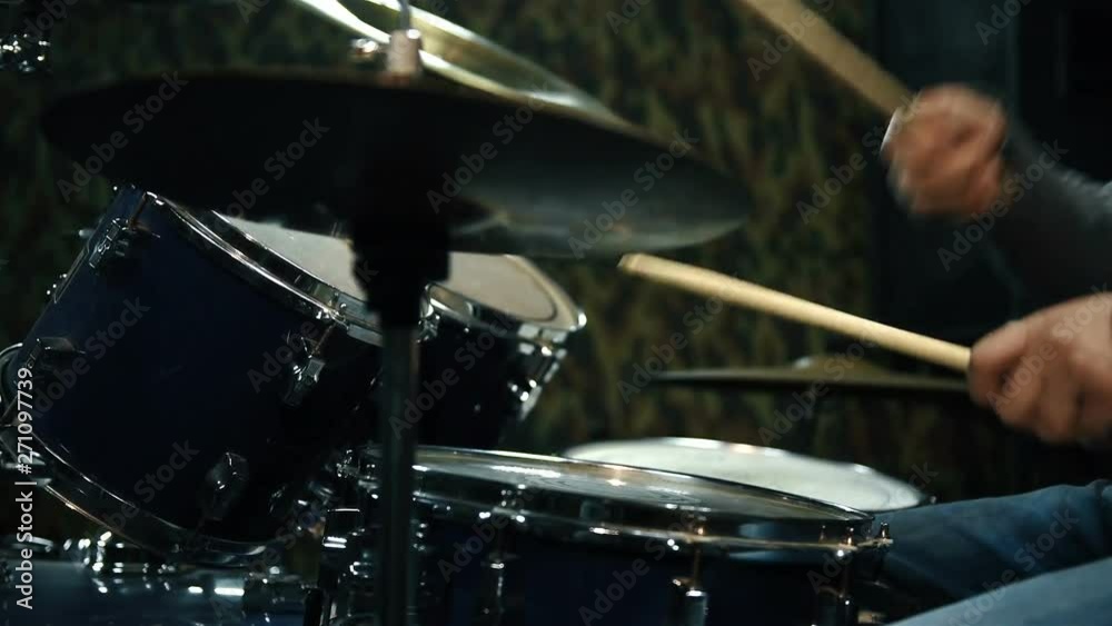 Musician Playing Drum Set In Studio. Close Up Musician Playing Drum Set In Studio. Close Up