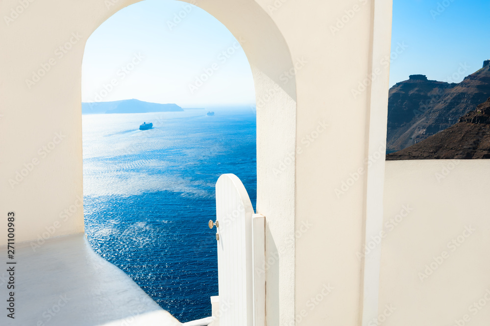 Premium Photo  Open door with mediterranean sea view in santorini