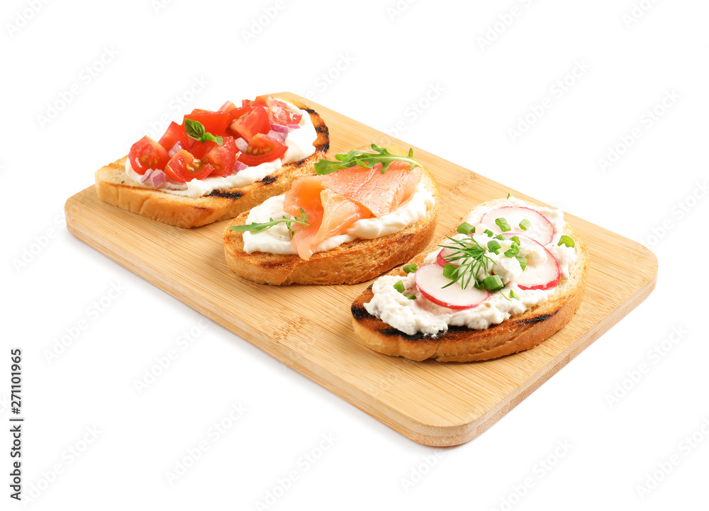 Board with different tasty bruschettas on white background Board with different tasty bruschettas on white background