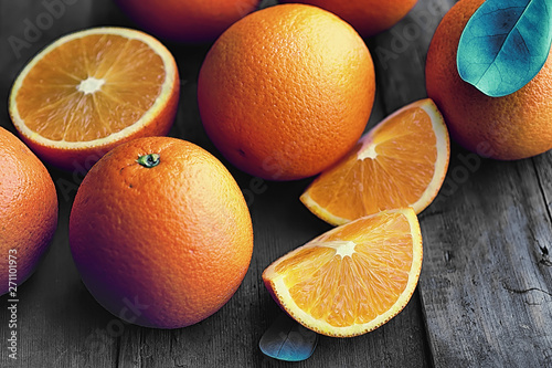 Fotografia Orange citrus fruit on a stone table. Orange background.