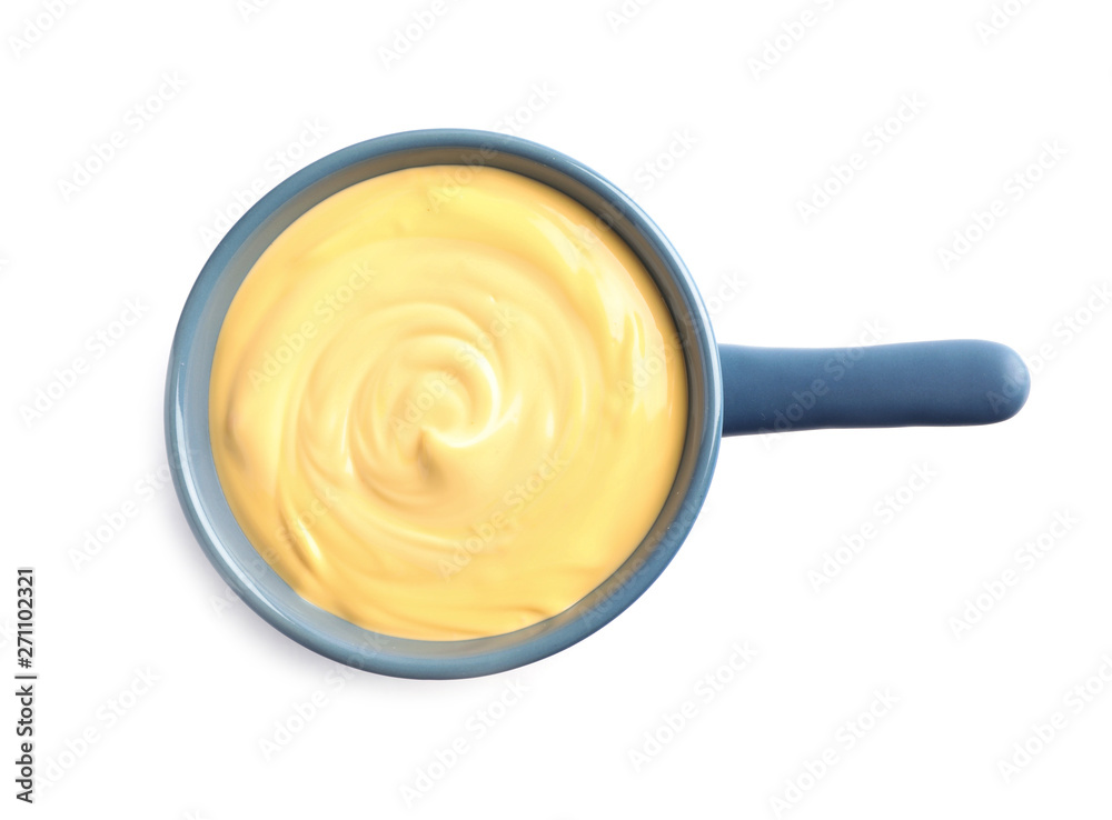 Pot with delicious cheese fondue on white background, top view