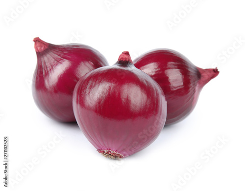 Fresh whole red onions on white background