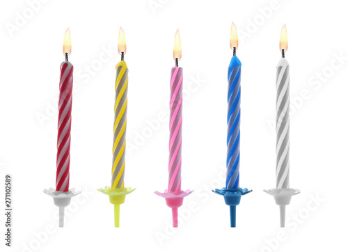 Color birthday cake candles on white background