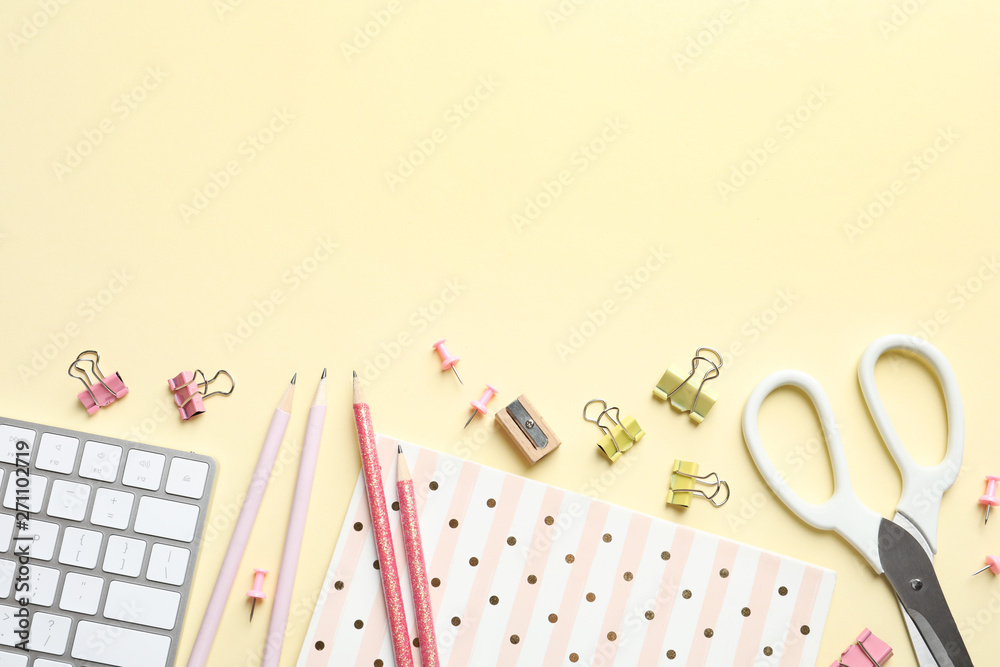 Flat lay composition with scissors and office supplies on color background. Space for text Flat lay composition with scissors and office supplies on color background. Space for text