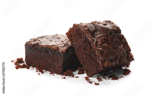 Pieces of fresh brownie on white background. Delicious chocolate pie