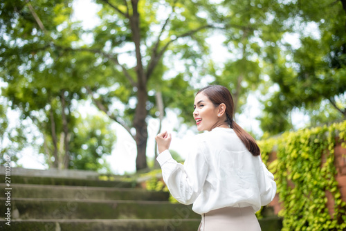 Beautiful Business  woman is successful  outdoor © tonefotografia