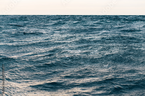 dark blue sea water background, waves of blue in black sea © Дарья Фомина
