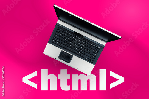 HTML Hyper Text Markup Language. laptop on html tag