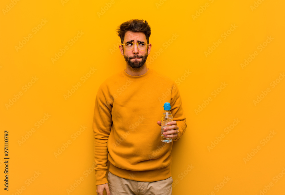 Young man thinking about an idea Young man thinking about an idea
