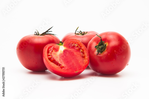  Pile of fresh tomatoes isolated on white background