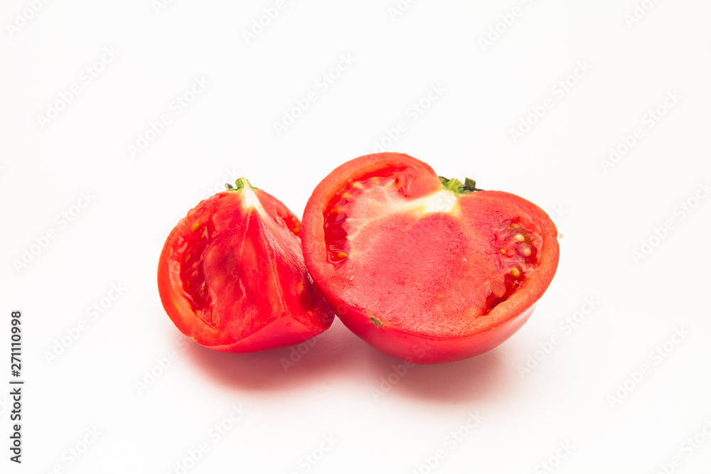 Fresh Tomato sliced on a white background Fresh Tomato sliced on a white background