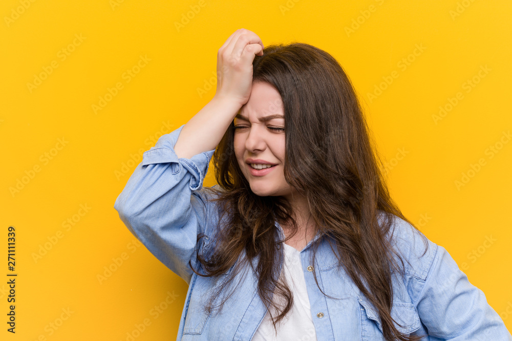 Young curvy plus size woman forgetting something, slapping forehead with palm and closing eyes. Young curvy plus size woman forgetting something, slapping forehead with palm and closing eyes.