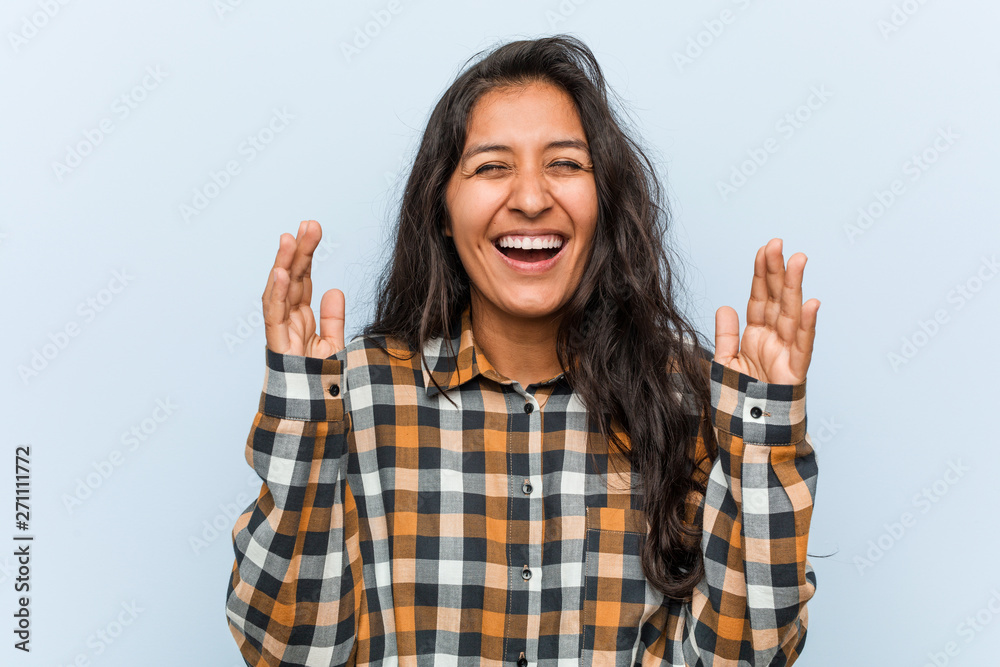 Young cool indian woman joyful laughing a lot. Happiness concept. Young cool indian woman joyful laughing a lot. Happiness concept.