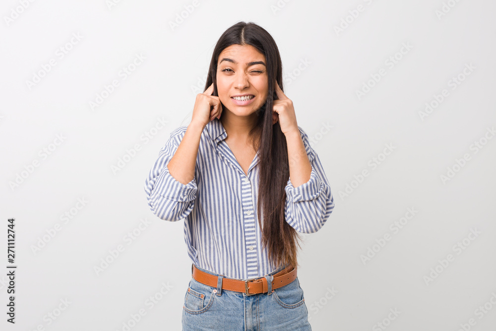 Young pretty arab woman covering ears with hands. Young pretty arab woman covering ears with hands.