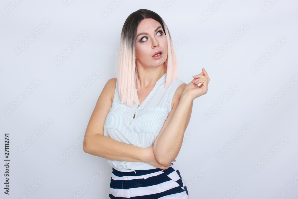 Lovely blonde woman wearing summer shorts and blouse