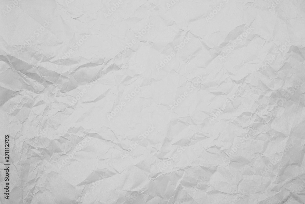 Naklejka premium Paper crumpled white background. Abstract texture wallpaper.
