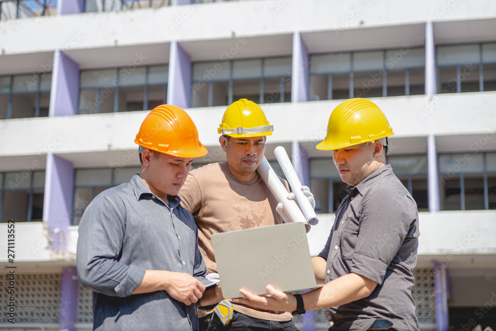 Engineer team and worker checking blueprint for emolition construction plan and inspect at the site. Engineer team and worker checking blueprint for emolition construction plan and inspect at the site.