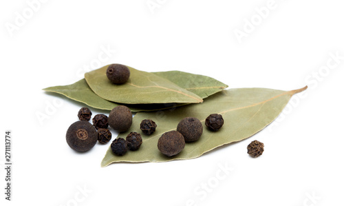 Bay leaf, allspice and pepper isolated on white background