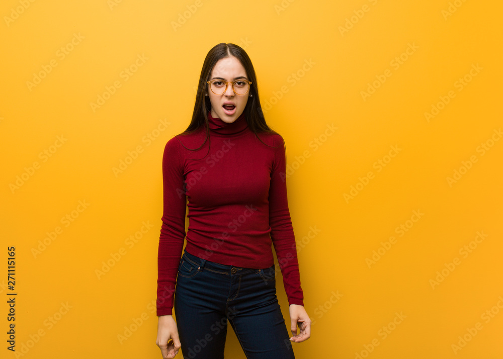 Intellectual young girl screaming very angry and aggressive Intellectual young girl screaming very angry and aggressive