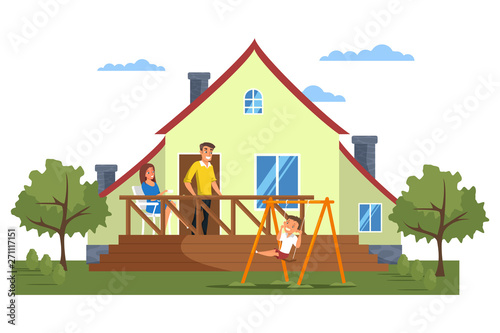 Happy modern family in front of house
