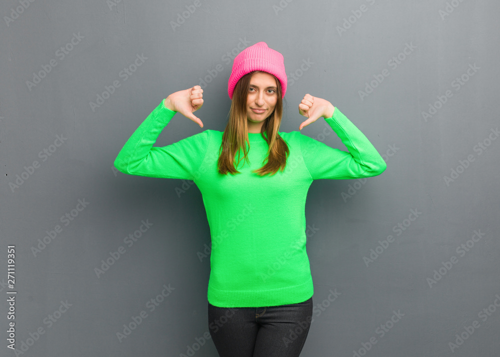 Young natural russian girl pointing fingers, example to follow Young natural russian girl pointing fingers, example to follow