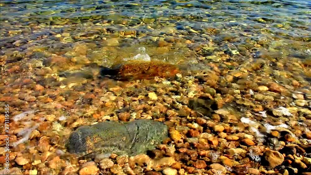 Relaxing view of sea waves on rocky beach Relaxing view of sea waves on rocky beach
