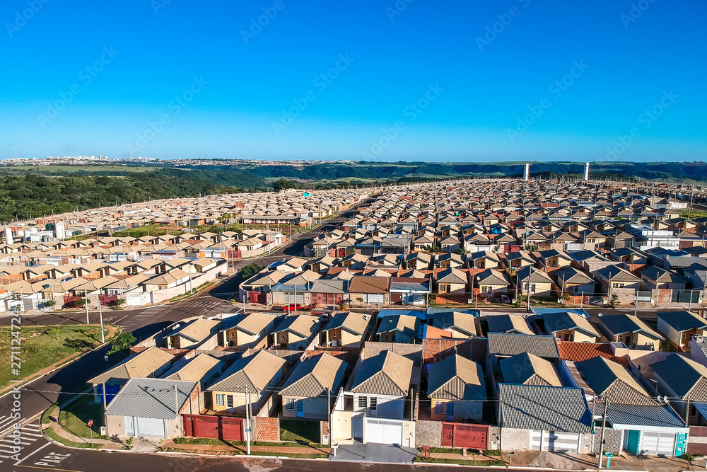Fototapeta premium Aerial view of standardized houses of the Minha Casa Minha Vida Program of the State of Sao Paulo, Brazil