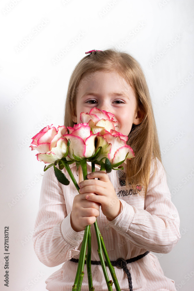 little girl with bouquet of flowers