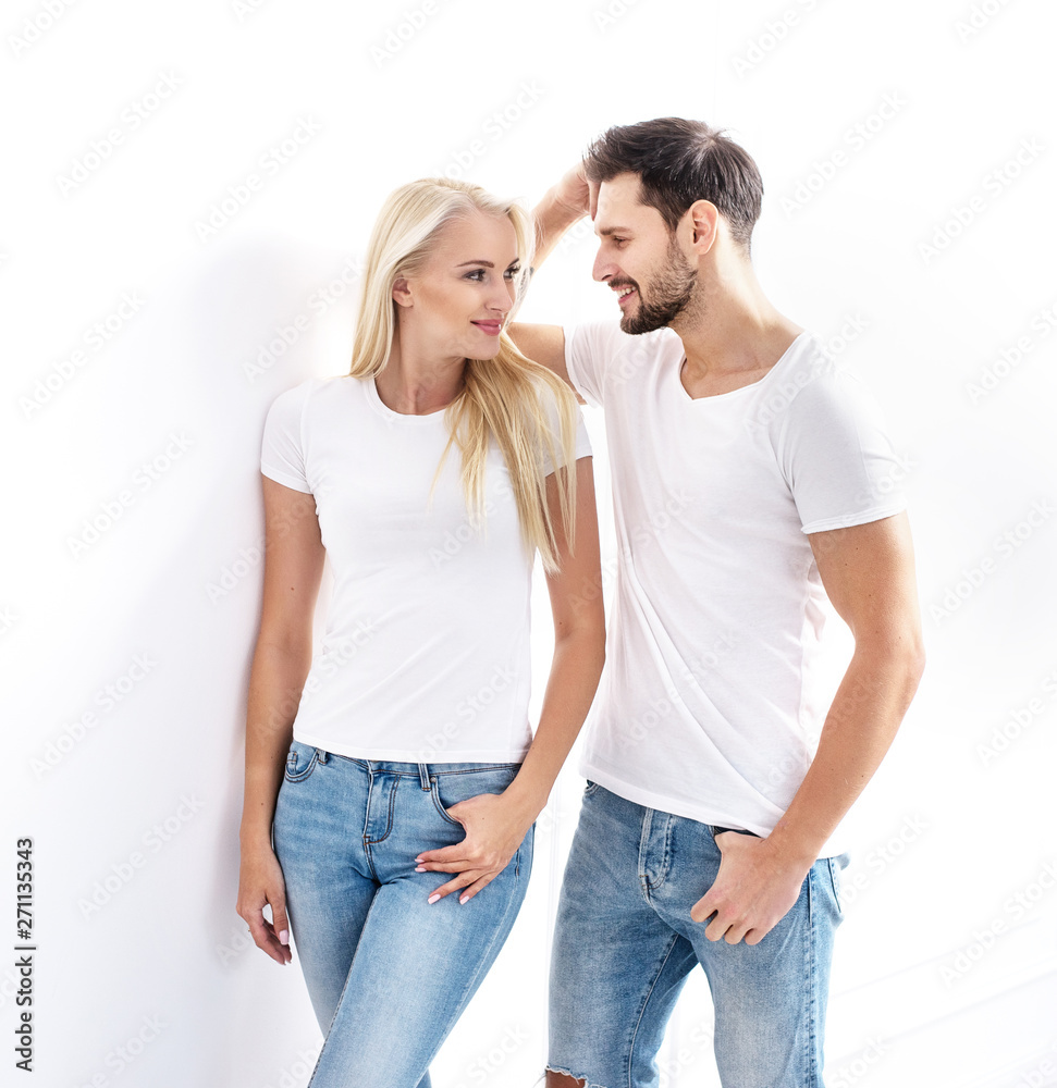 Portrait of a young, attractive couple wearing casual clothes Portrait of a young, attractive couple wearing casual clothes