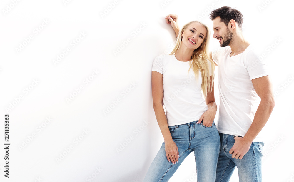 Portrait of a young, attractive couple wearing casual clothes Portrait of a young, attractive couple wearing casual clothes