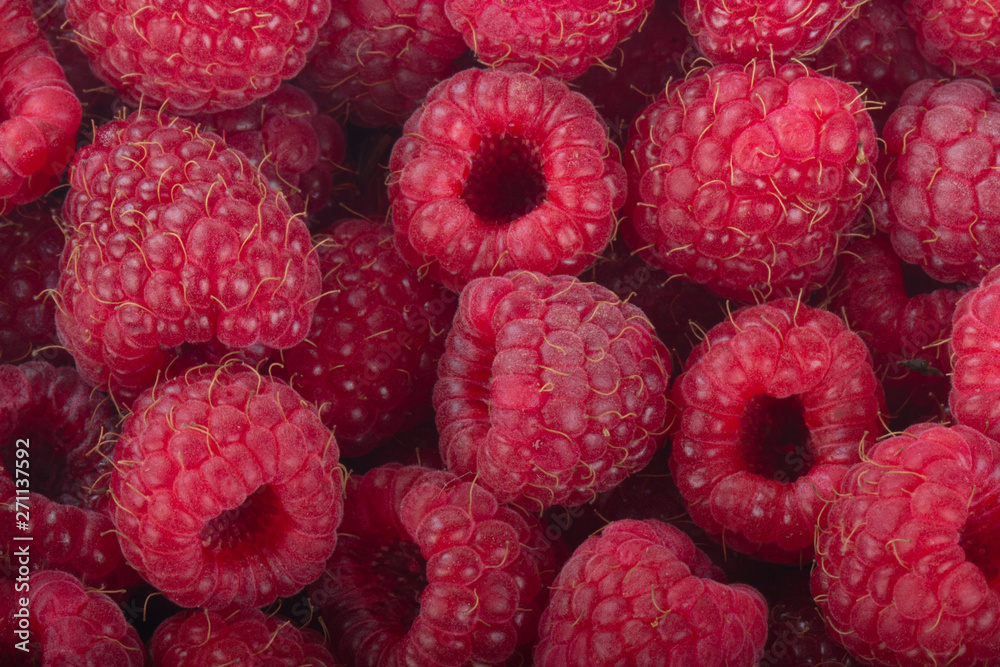heap of red raspberries background heap of red raspberries background
